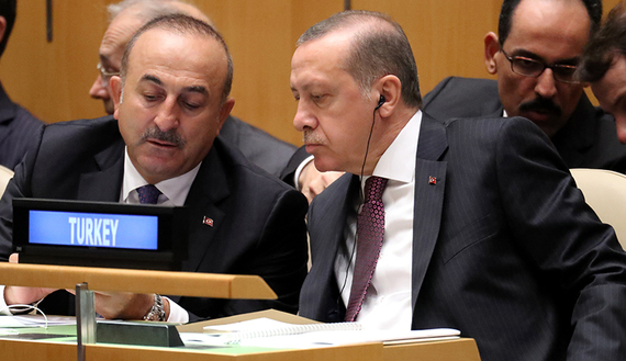 President Erdogan of Turkey speaks with his Foreign Minister Cavusoglu during the 71st United Nations General Assembly in New York